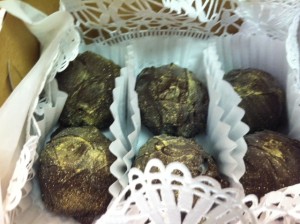 Gold dust Champagne Sorbet covered in chocolate and dusted with gold.